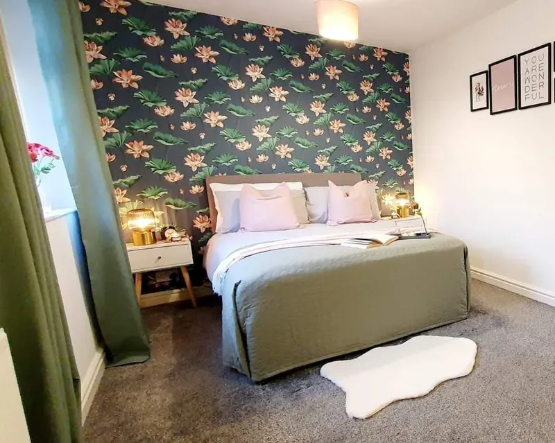 Dark floral wallpaper feature wall in a bedroom