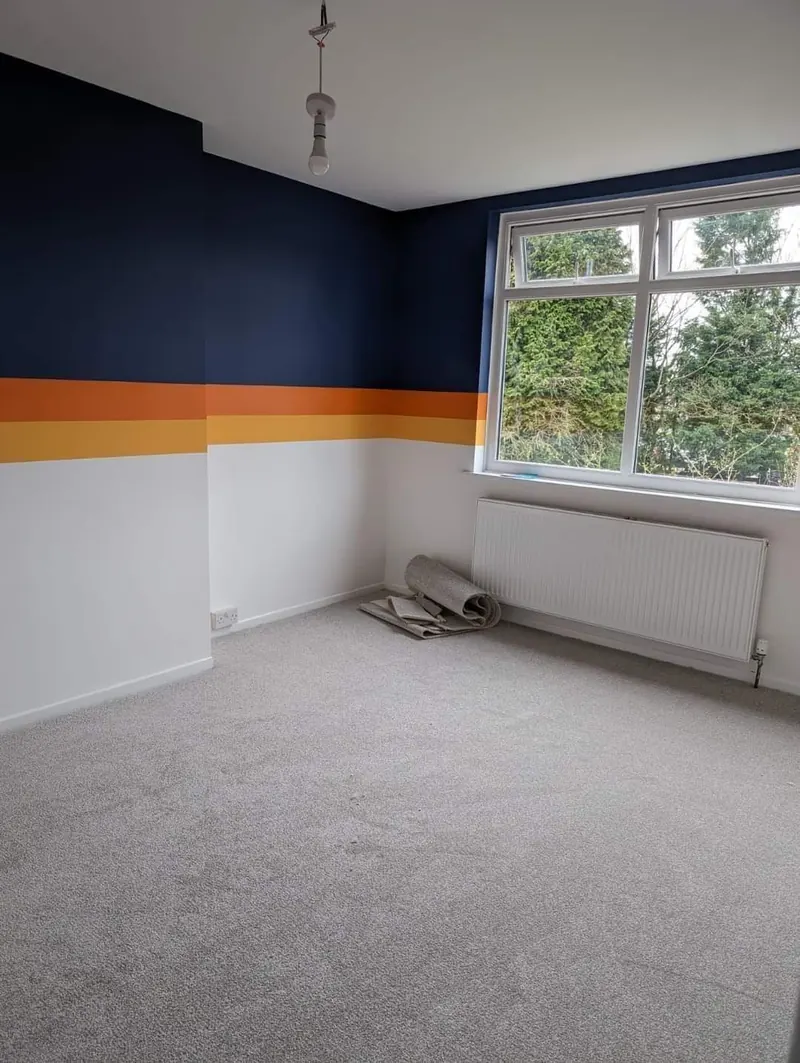 Navy and orange striped scheme carried around a bedroom