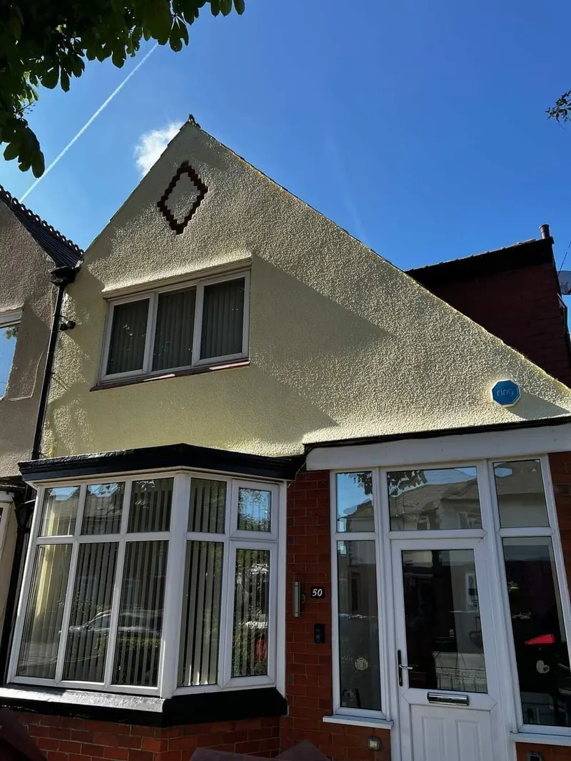 Rendered gable end and bay windows repainted on a period semi