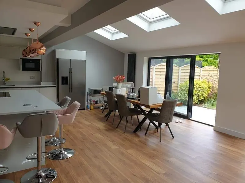 Loft-conversion kitchen-diner finished in white