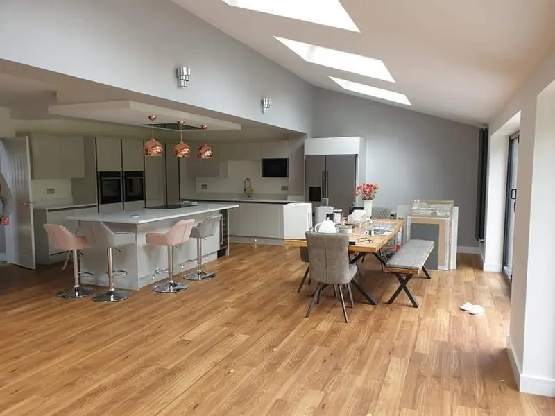 Kitchen-diner repainted in clean whites